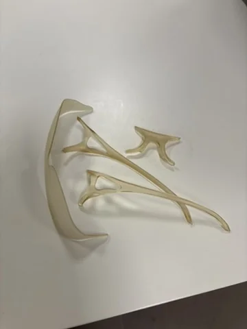 Raw unfinished prototype pieces for Fondere laid out on a table