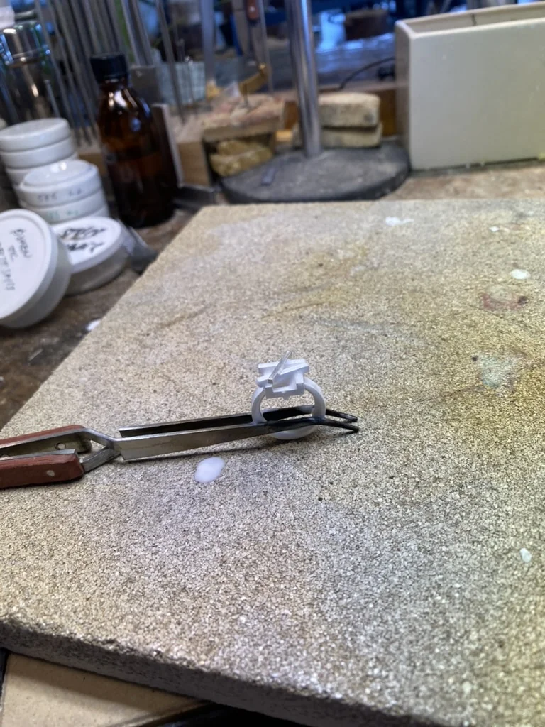Ring held in a soldering jig during assembly