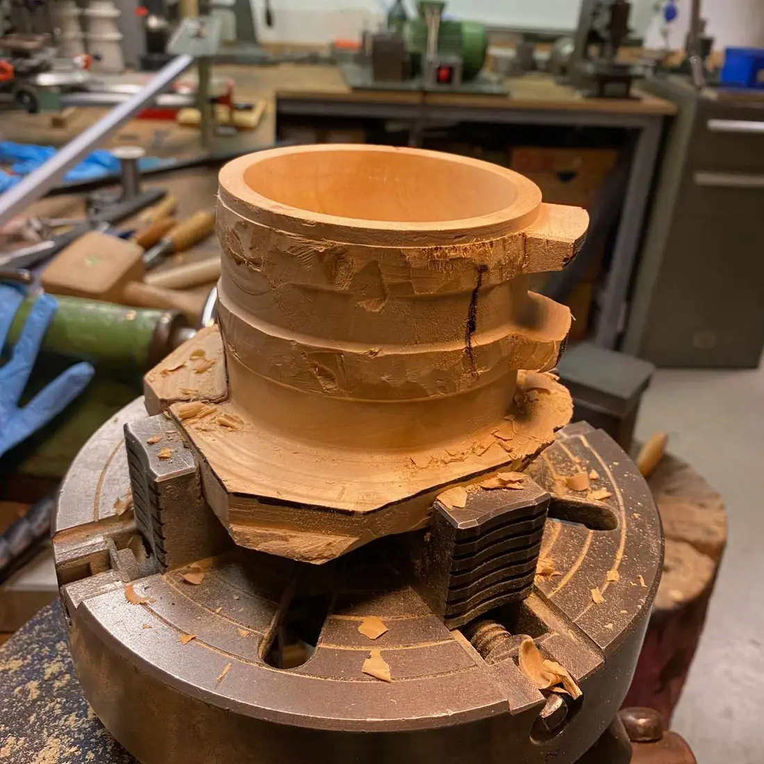 Turning and hollowing the birch burl on a lathe chuck