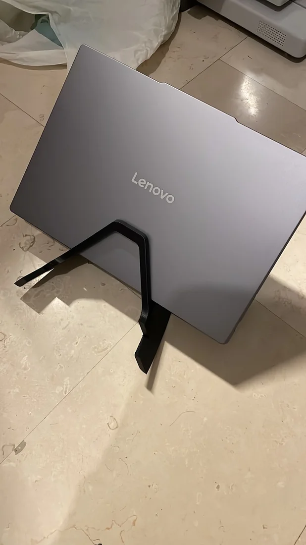 3D printed prototype holding a Lenovo laptop